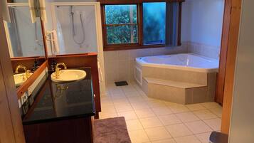 Jetted bath, hair dryer, towels, soap