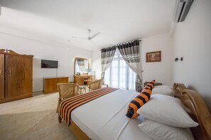 Minibar, individually furnished, desk, rollaway beds