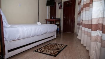 Premium bedding, desk, iron/ironing board, free WiFi