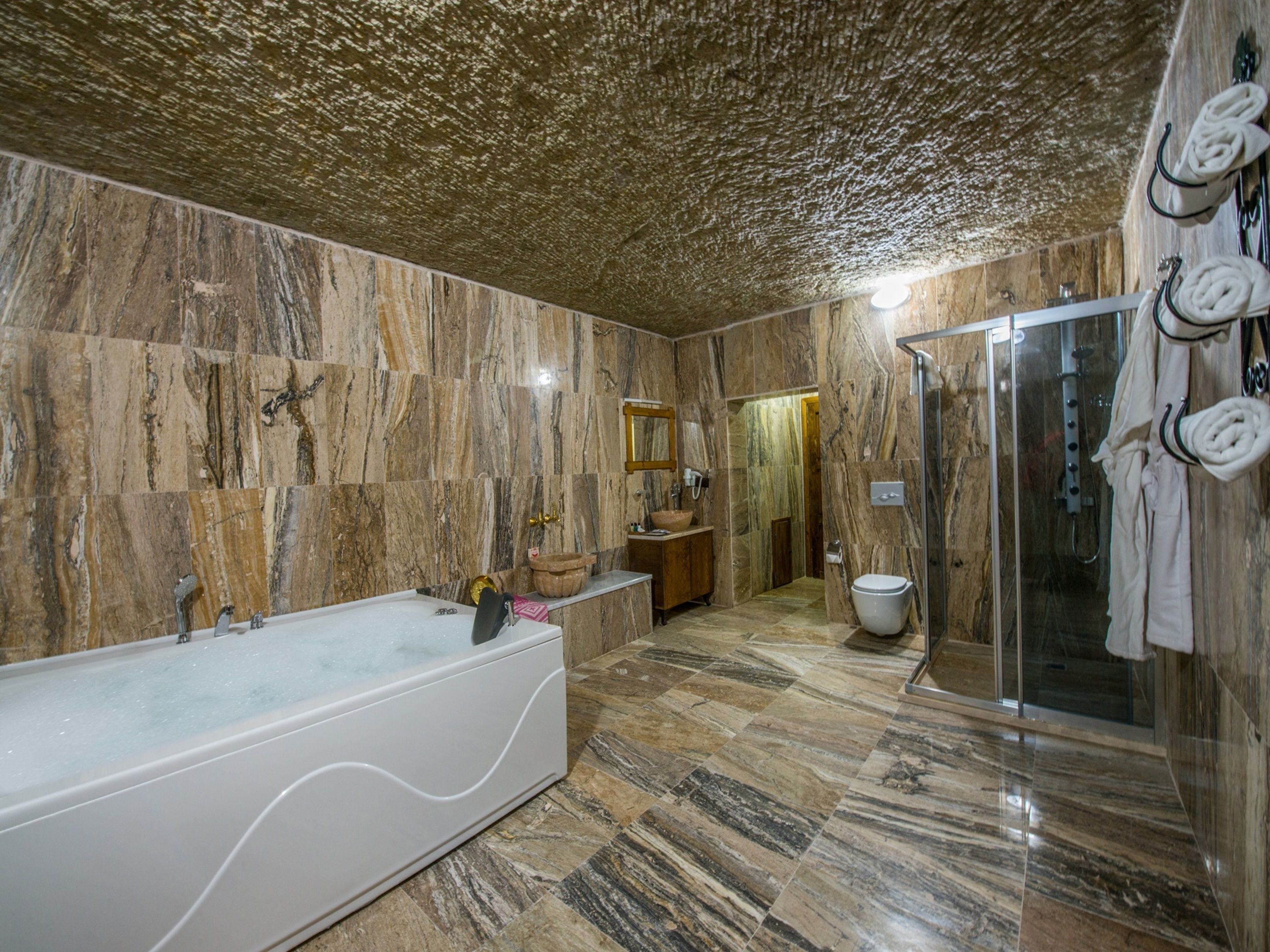 family suite, multiple beds, non smoking, garden view | bathroom | shower, free toiletries, hair dryer, slippers