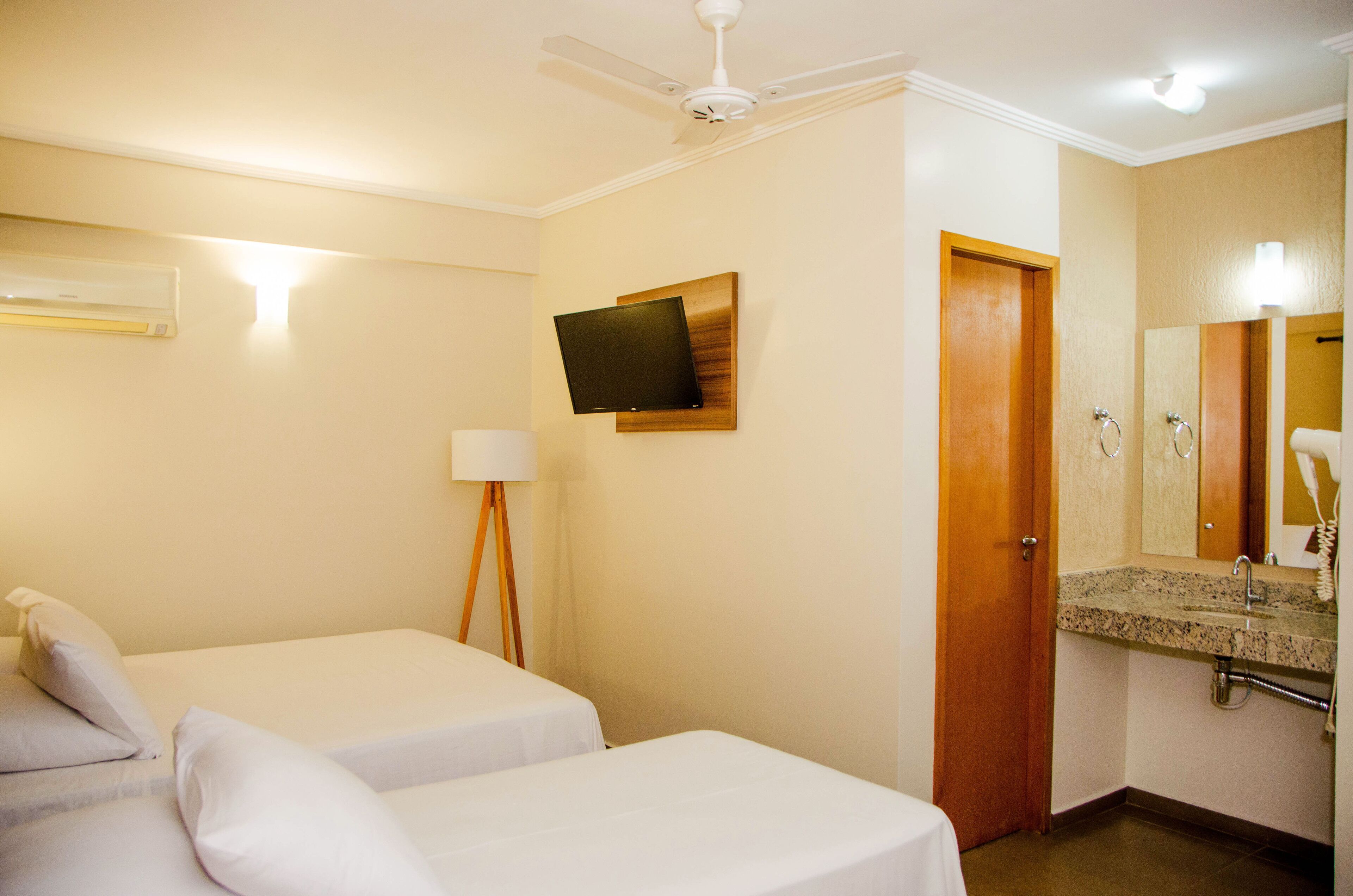 superior triple room | bathroom | shower, hair dryer, towels