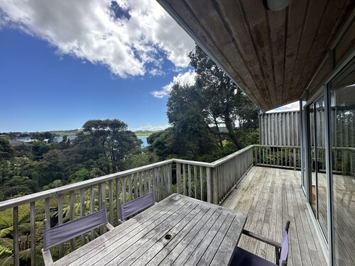Sunny with decks and bush/harbour views. Three bedrooms. Pet friendly.