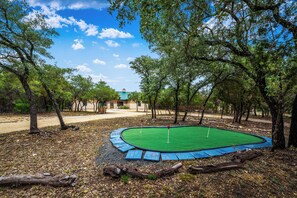 Property grounds - Private pool, pickleball court, single story home, less than 5-minute drive to THE Frio River (Concan)