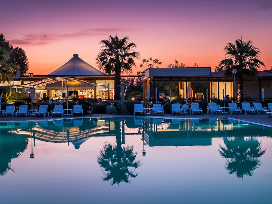 Seasonal outdoor pool, pool umbrellas, pool loungers