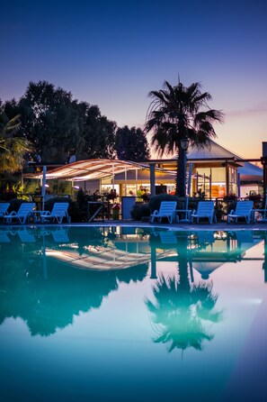 Seasonal outdoor pool, pool umbrellas, pool loungers