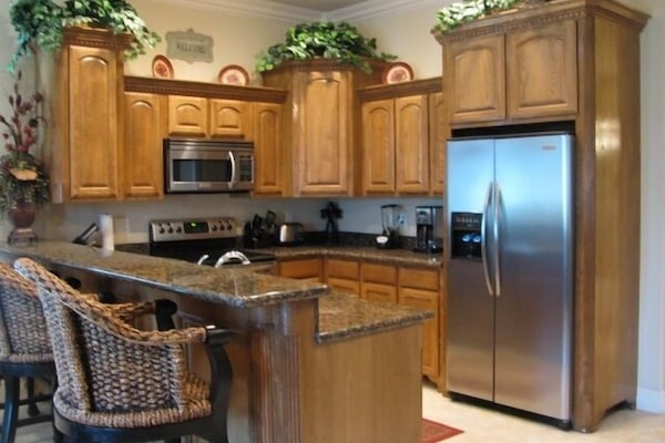 Enjoy an amazing meal in our gourmet kitchen. 2025 condo freshly painted.