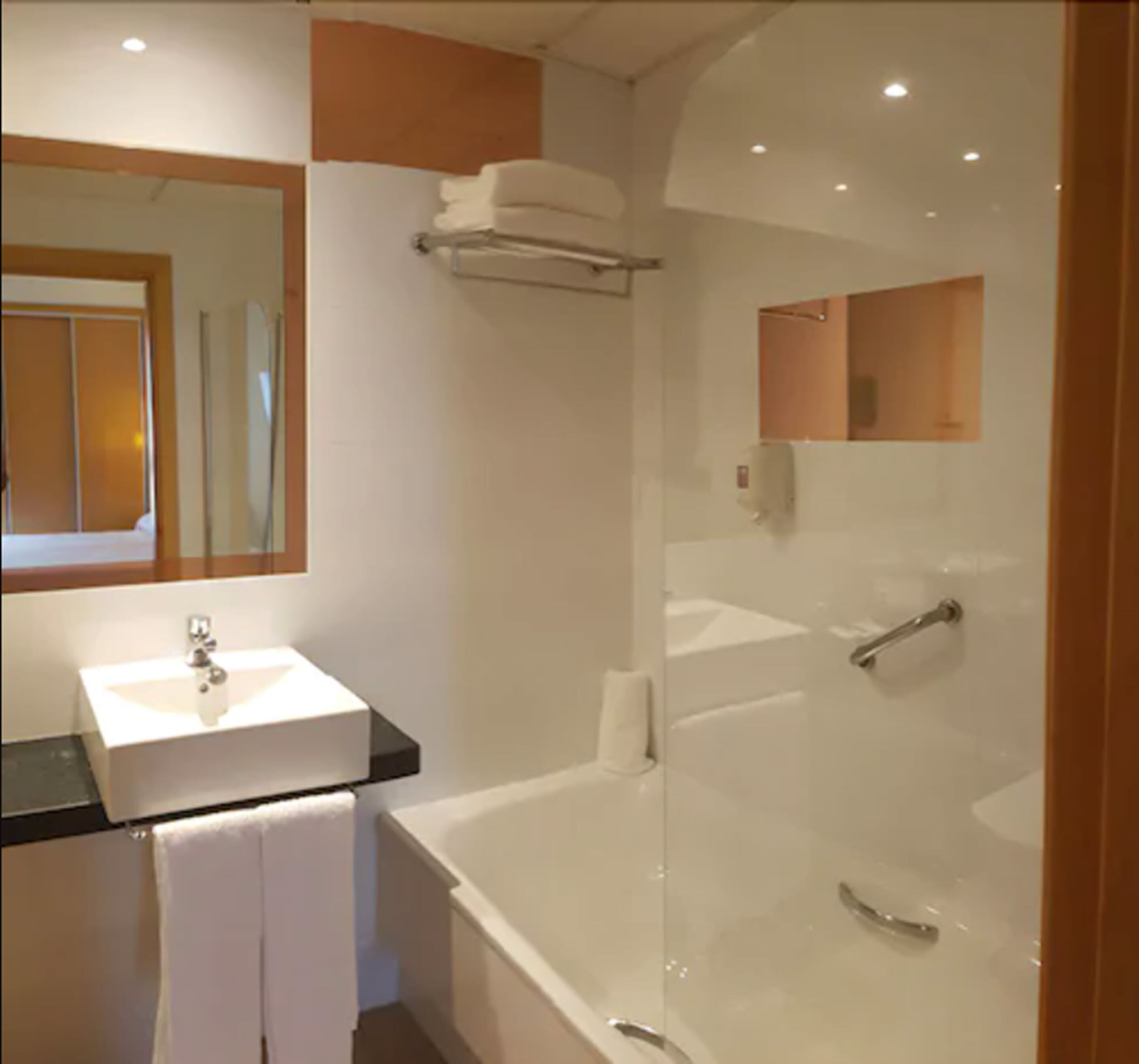 combined shower/bathtub, free toiletries, hair dryer, towels