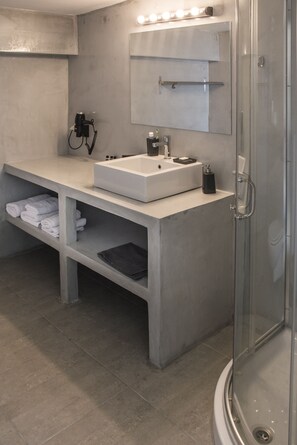 Combined shower/tub, hair dryer, towels, soap