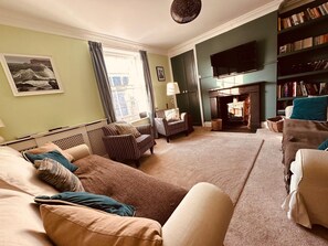 Smart TV, fireplace, DVD player, books