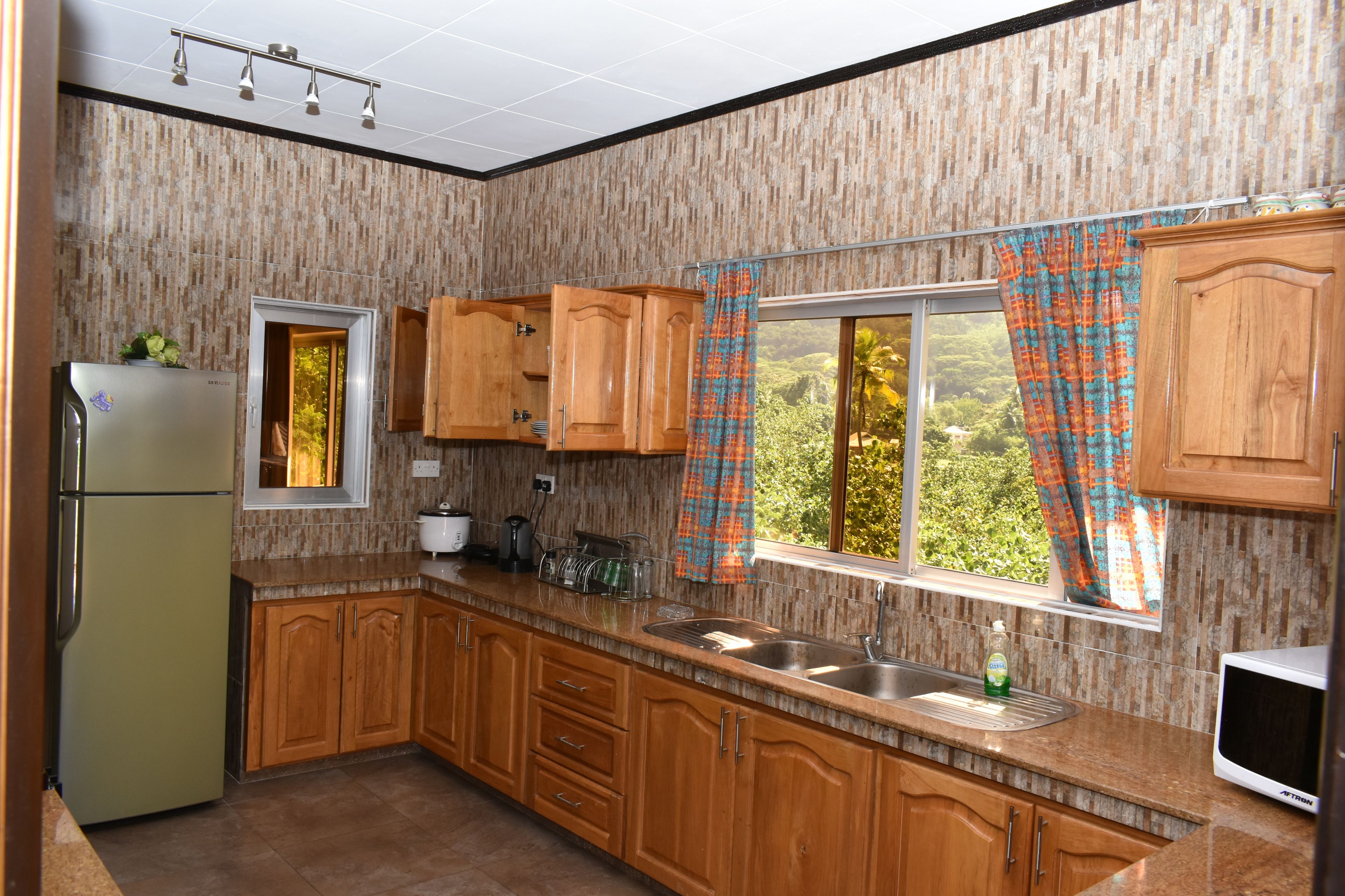Apartment, 2 Bedrooms | Shared kitchen facilities | Espresso maker, fridge, microwave, oven
