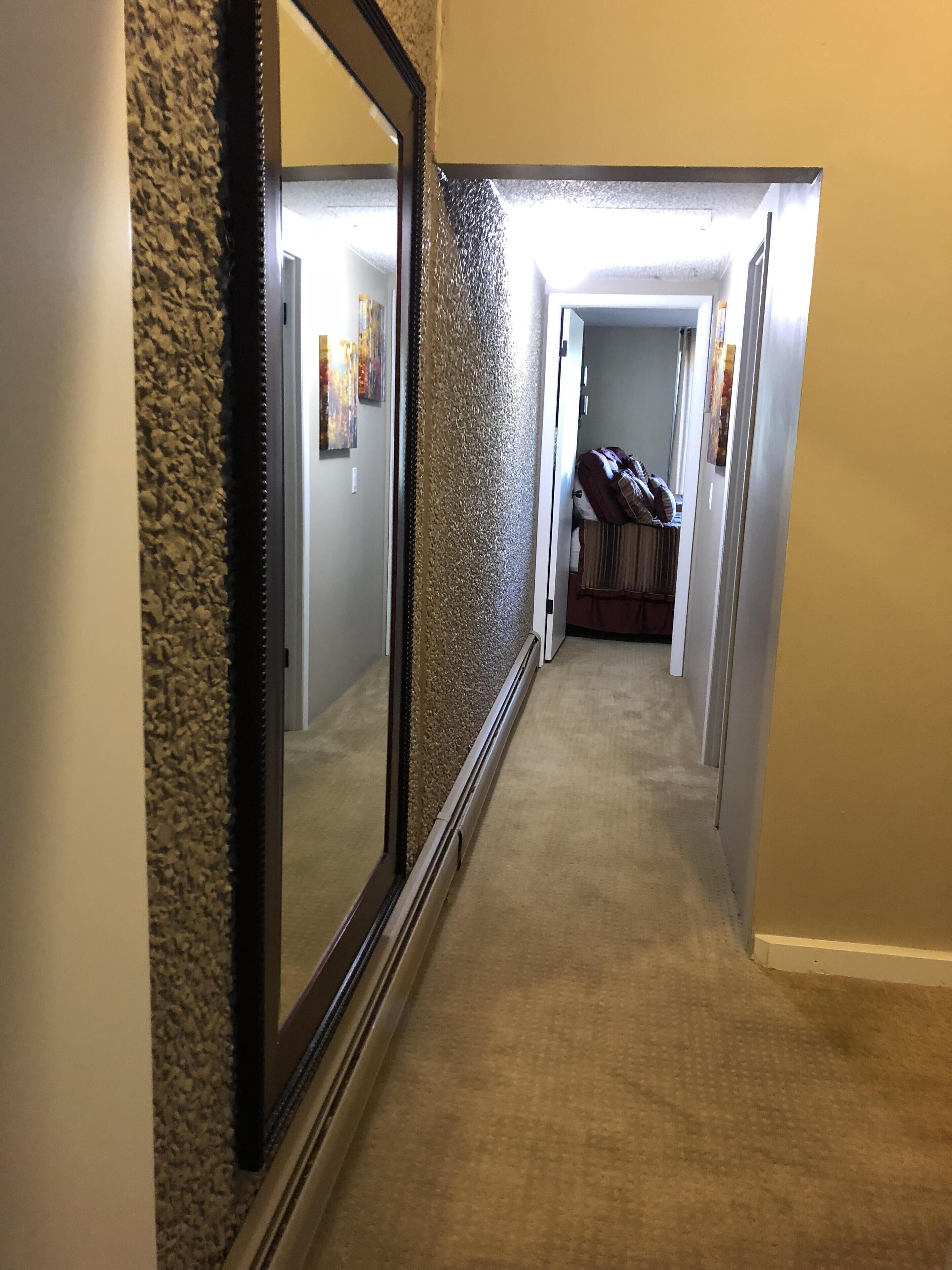 Second floor hallway divides two large bedrooms