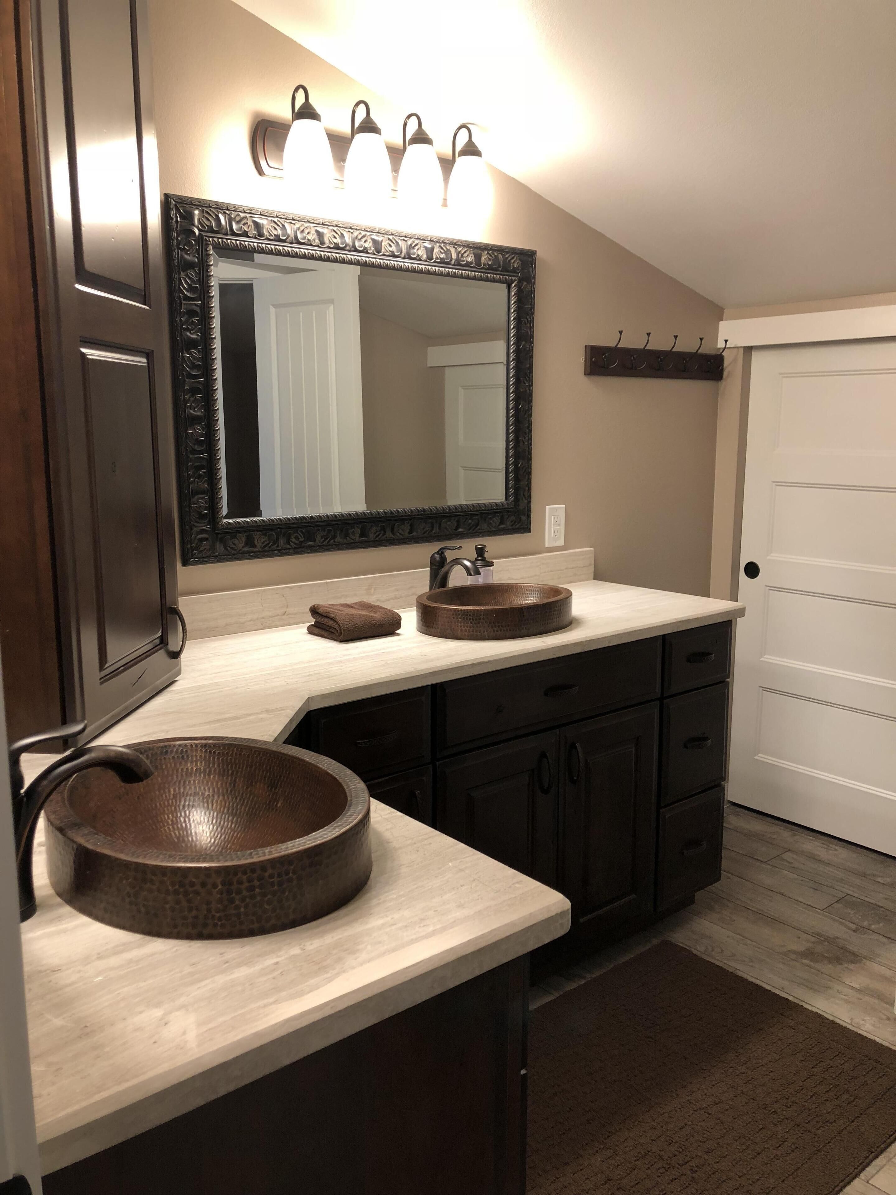 3rd floor master bathroom en suite with double sinks