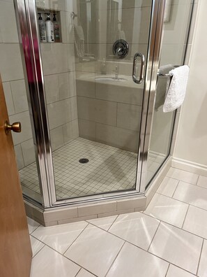 Combined shower/tub, hair dryer, towels, soap