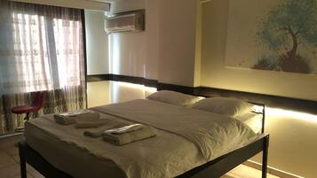 Suite, 1 Bedroom | Desk, iron/ironing board, free cribs/infant beds, free WiFi