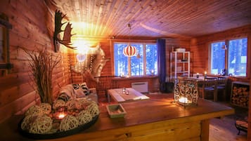 Cabin, River View (Lehti Main) | Living room | Fireplace