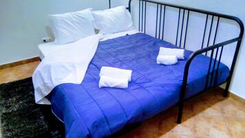 2 chambres, chambres insonorisées, fer et planche à repasser