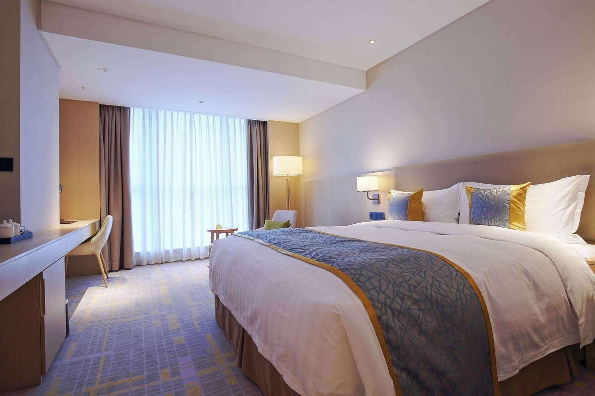 Business kamer, 1 kingsize bed, niet-roken | Beddengoed