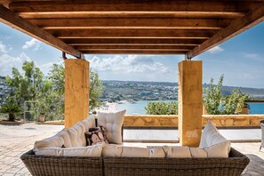 Terrace/patio - Villa Emilia front sea amazing sunset , large swimming pool  can be heated . (Kalathas)