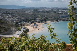 On the beach, beach towels - Villa Emilia front sea amazing sunset , large swimming pool  can be heated . (Kalathas)