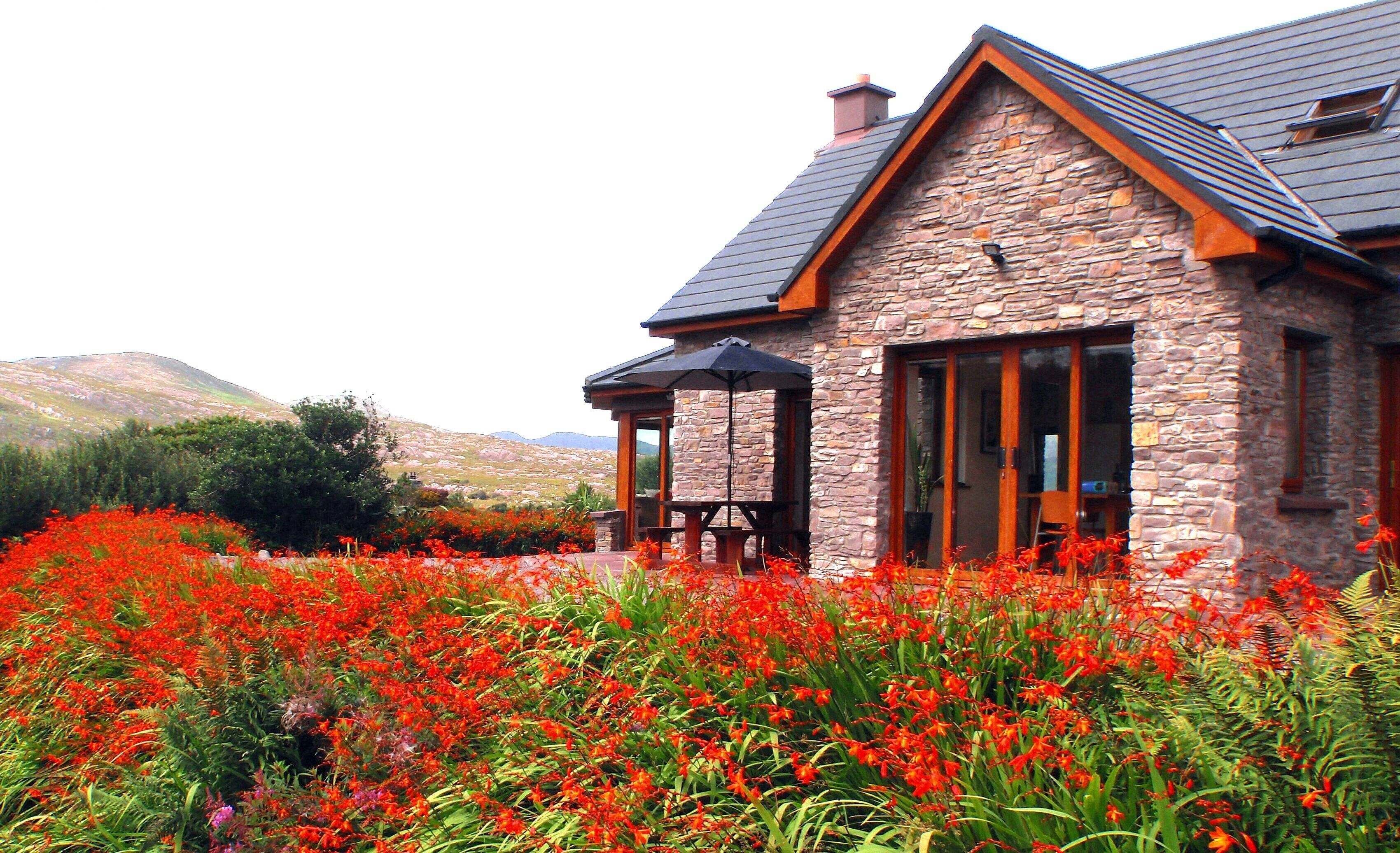 The gardens in full summer bloom are absolutely stunning.
