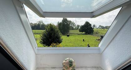 Idyllically situated. 90m2 apartment for families + travelers up to 5 persons + garden + terrace near the North Sea 