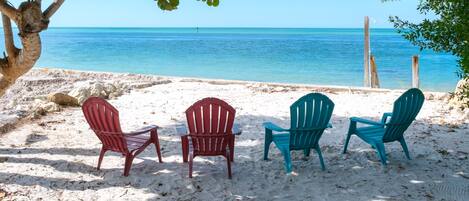 On the beach, sun-loungers, beach towels