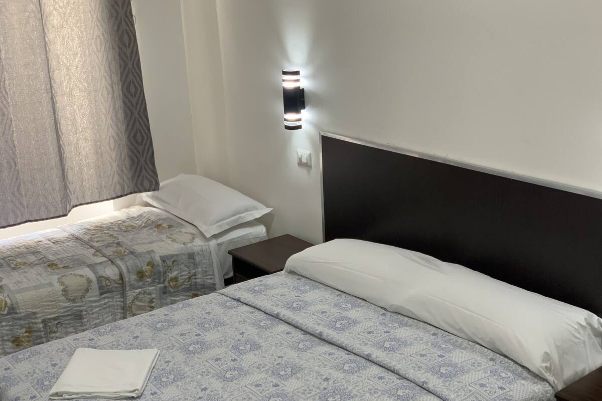 Family Quadruple Room | Desk, rollaway beds (surcharge), WiFi (free), bed sheets