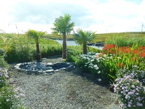 The garden in the summer is a blaze of colour.