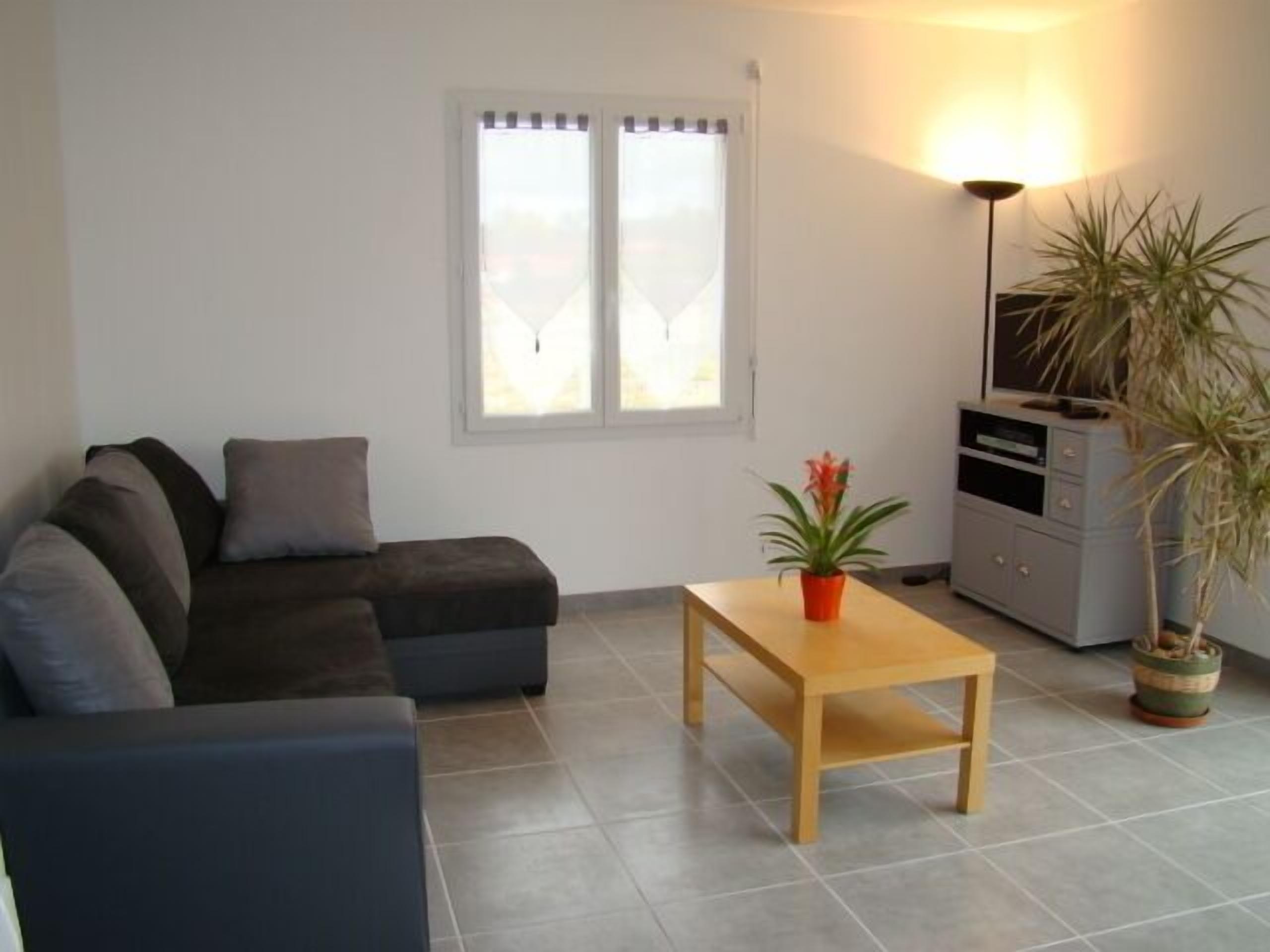 Maison individuelle avec terrasse et jardin