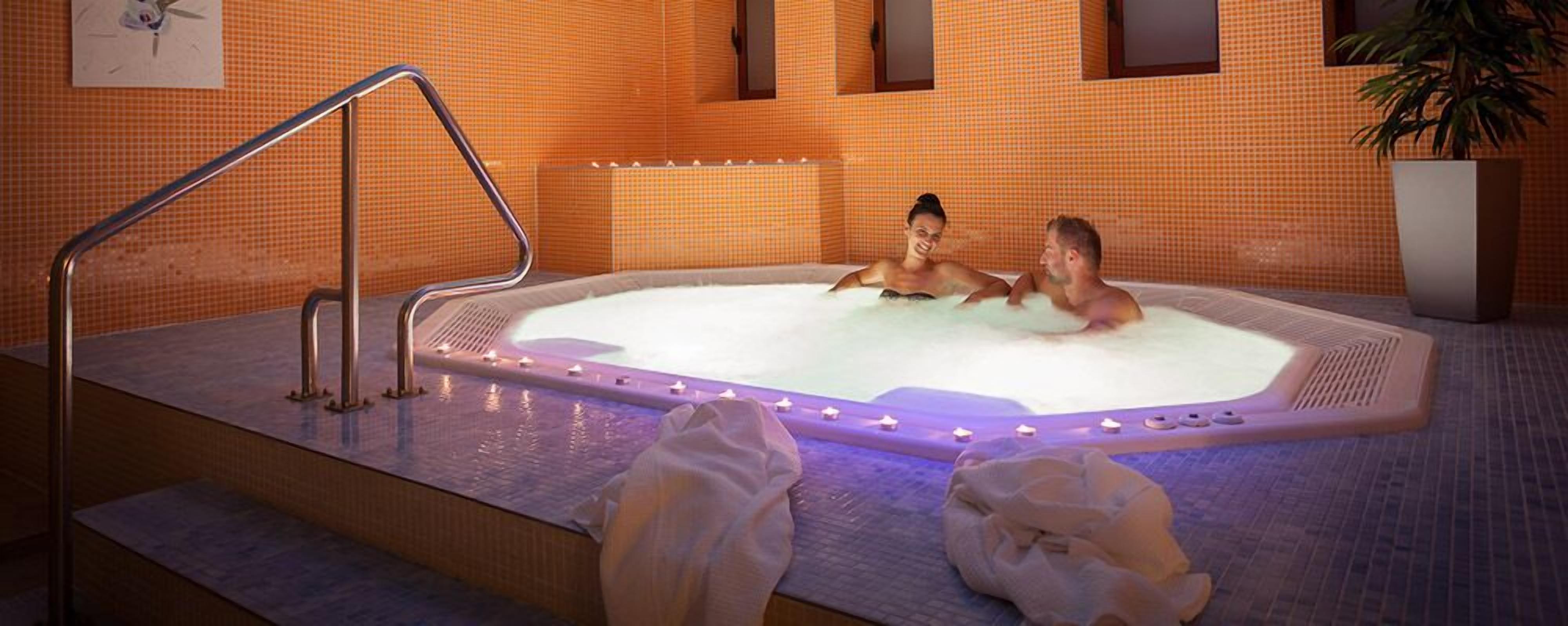 Sauna, hot tub, steam room, hot stone massages, deep-tissue massages