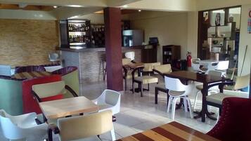 Breakfast, lunch, dinner served; local and international cuisine