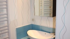 Bathtub, hair dryer