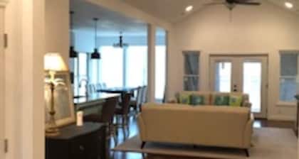 A NEWER UPSCALE LAKEFRONT HOME WITH POOL