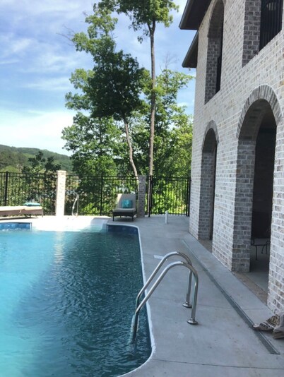 A NEWER UPSCALE LAKEFRONT HOME WITH POOL 