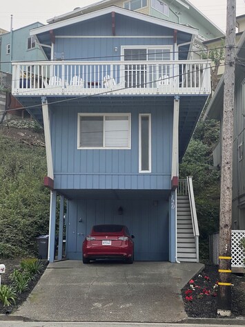 Outside view of house and carport