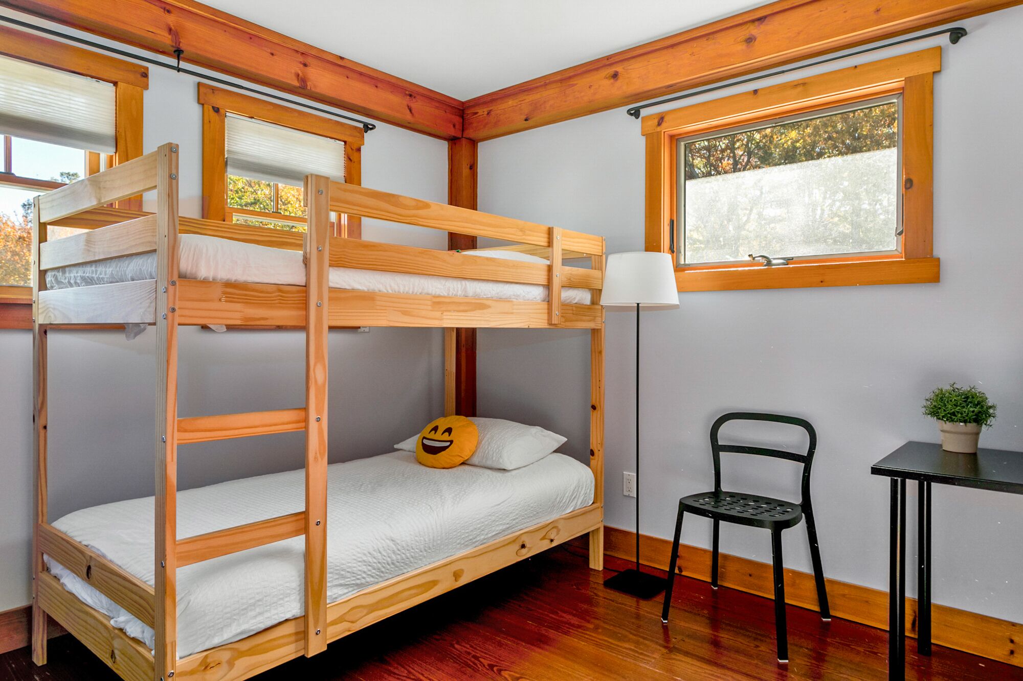 Fourth upstairs bedroom w/ bunkbeds and desk.  Feels like you're in a treehouse.