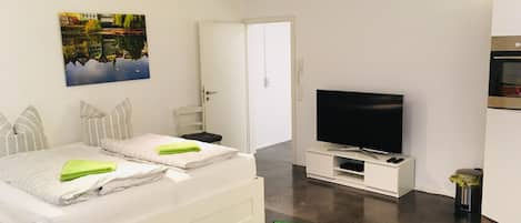 1 quarto, berço de viagem, Wi-Fi de cortesia, roupa de cama