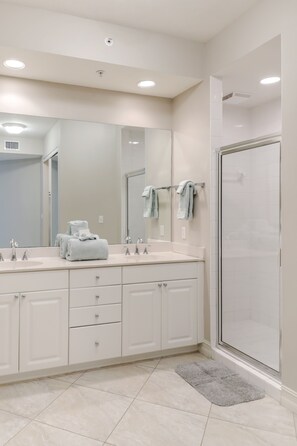 Shower, hair dryer, towels, soap