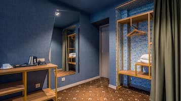 Deluxe Family Duplex Room | Minibar, in-room safe, individually decorated, desk