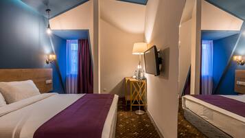 Minibar, in-room safe, individually decorated, desk