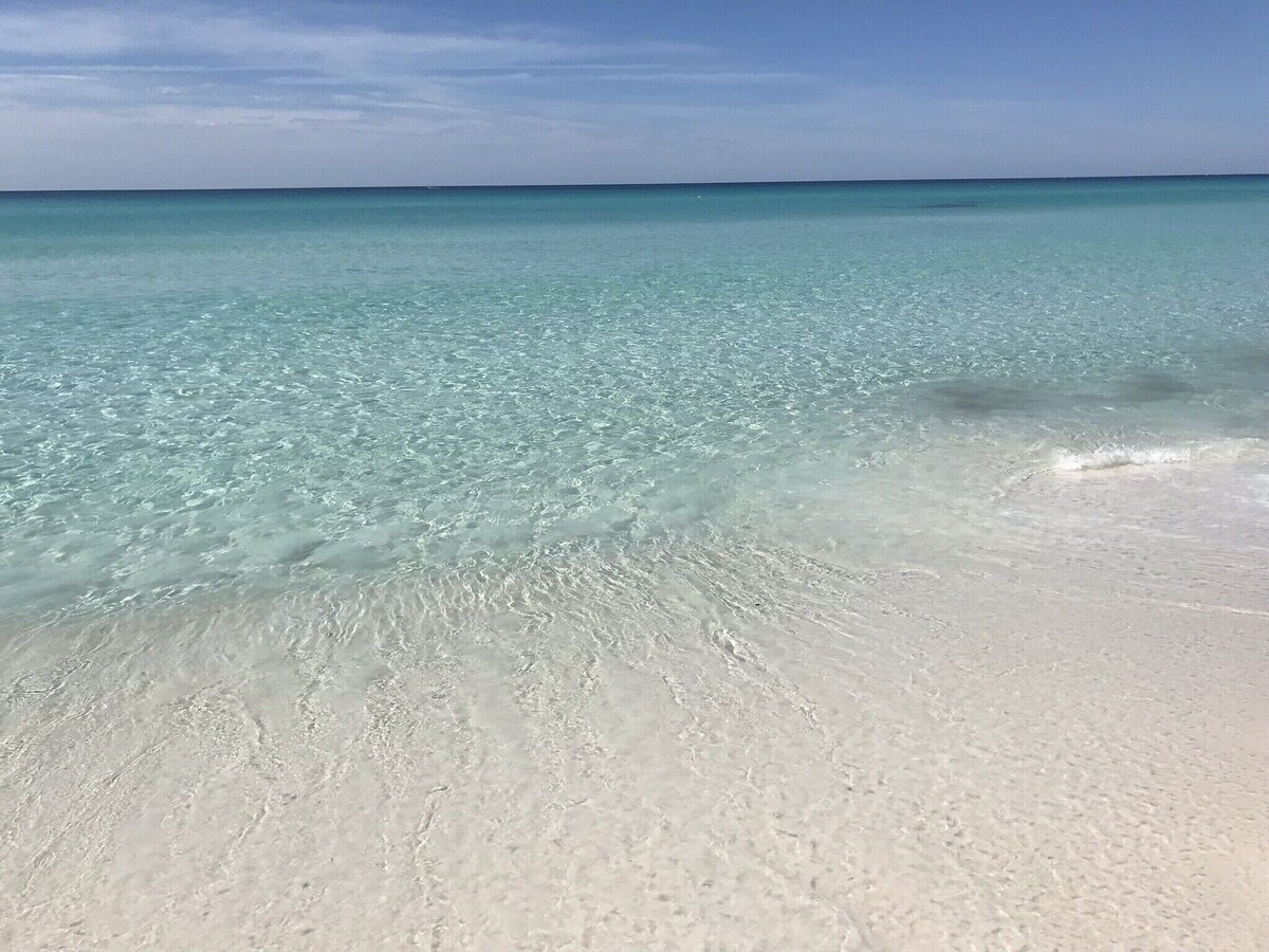 Photo 42 of Just a 60 second walk to sugar white sands!