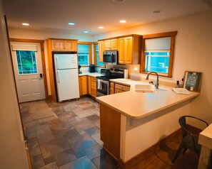 Fridge, microwave, oven, stovetop - Lake Michigan Cottage Retreat – Private Beach & Unforgettable Views (Muskegon)