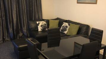 Premium Apartment, 2 Bedrooms, Non Smoking | Living area | Flat-screen TV