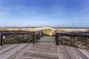 On the beach, sun loungers, beach towels