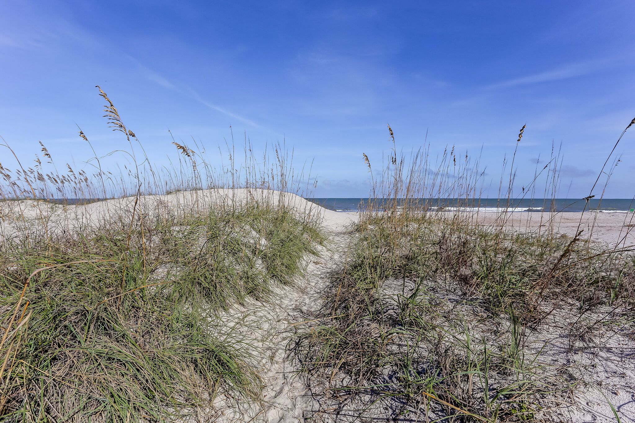 On the beach, sun loungers, beach towels