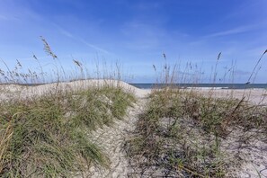 On the beach, sun-loungers, beach towels