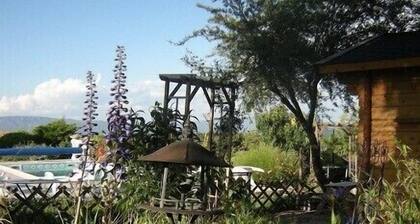 In a farmhouse with pool on the upland of a Provencal village