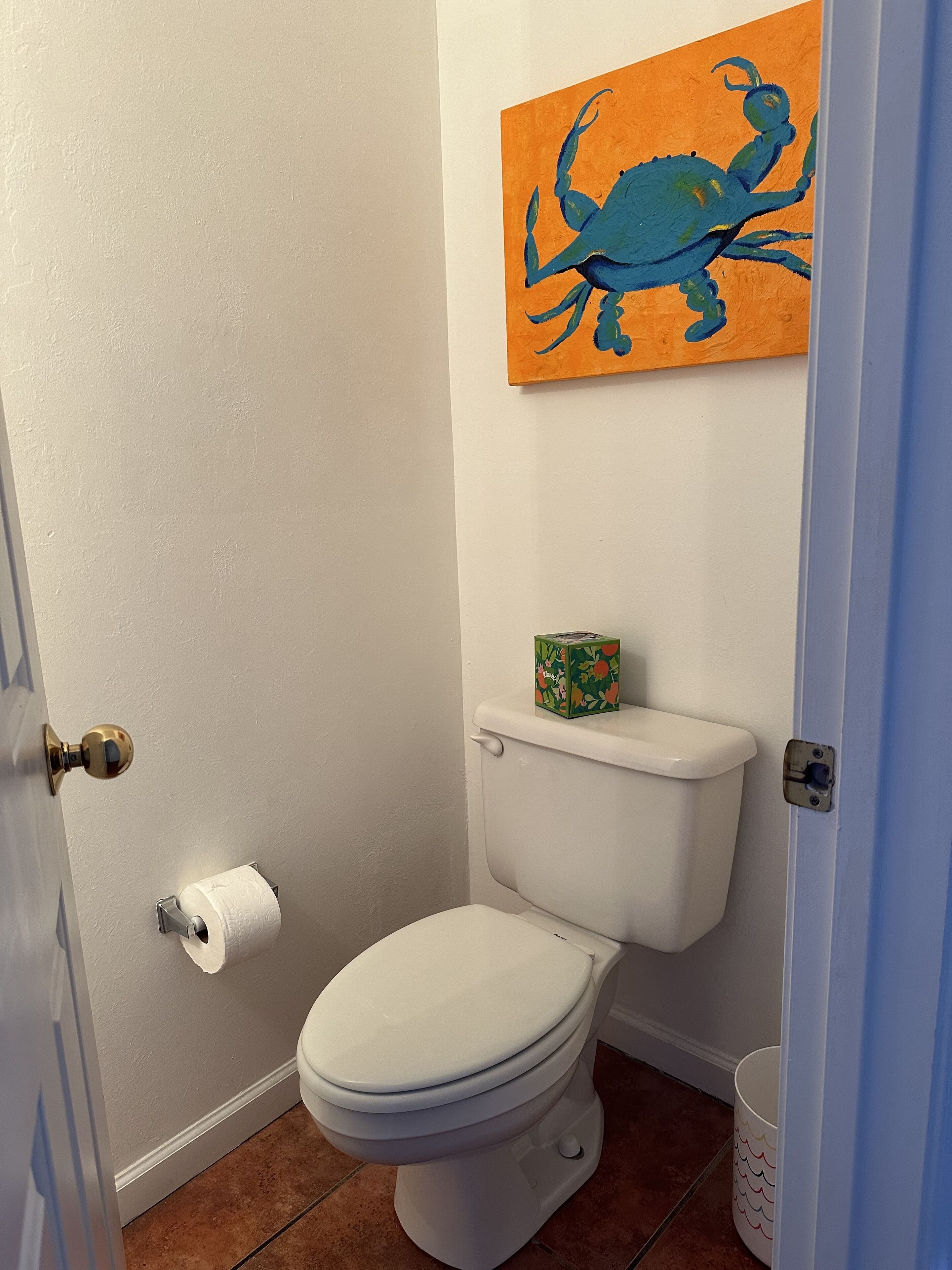Second bathroom - clean & bright area includes: sink, storage, & toilet