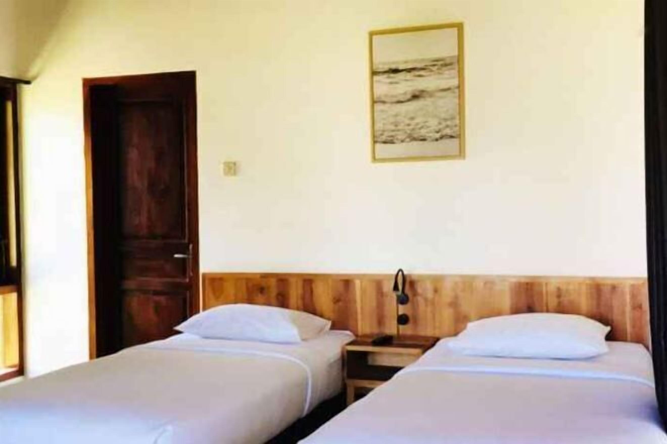 Fer et planche à repasser, literie fournie