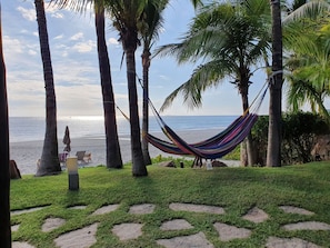 On the beach, sun loungers, beach towels